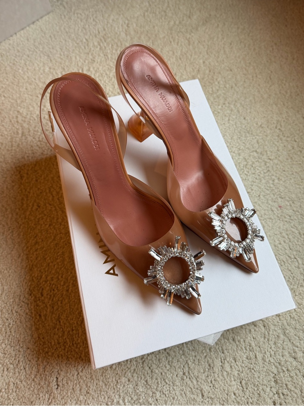 Amina Muaddi Nude Slingback Pumps with Crystal Sunburst Accent